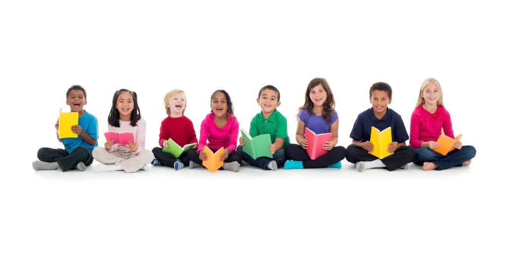 Children sitting together with books