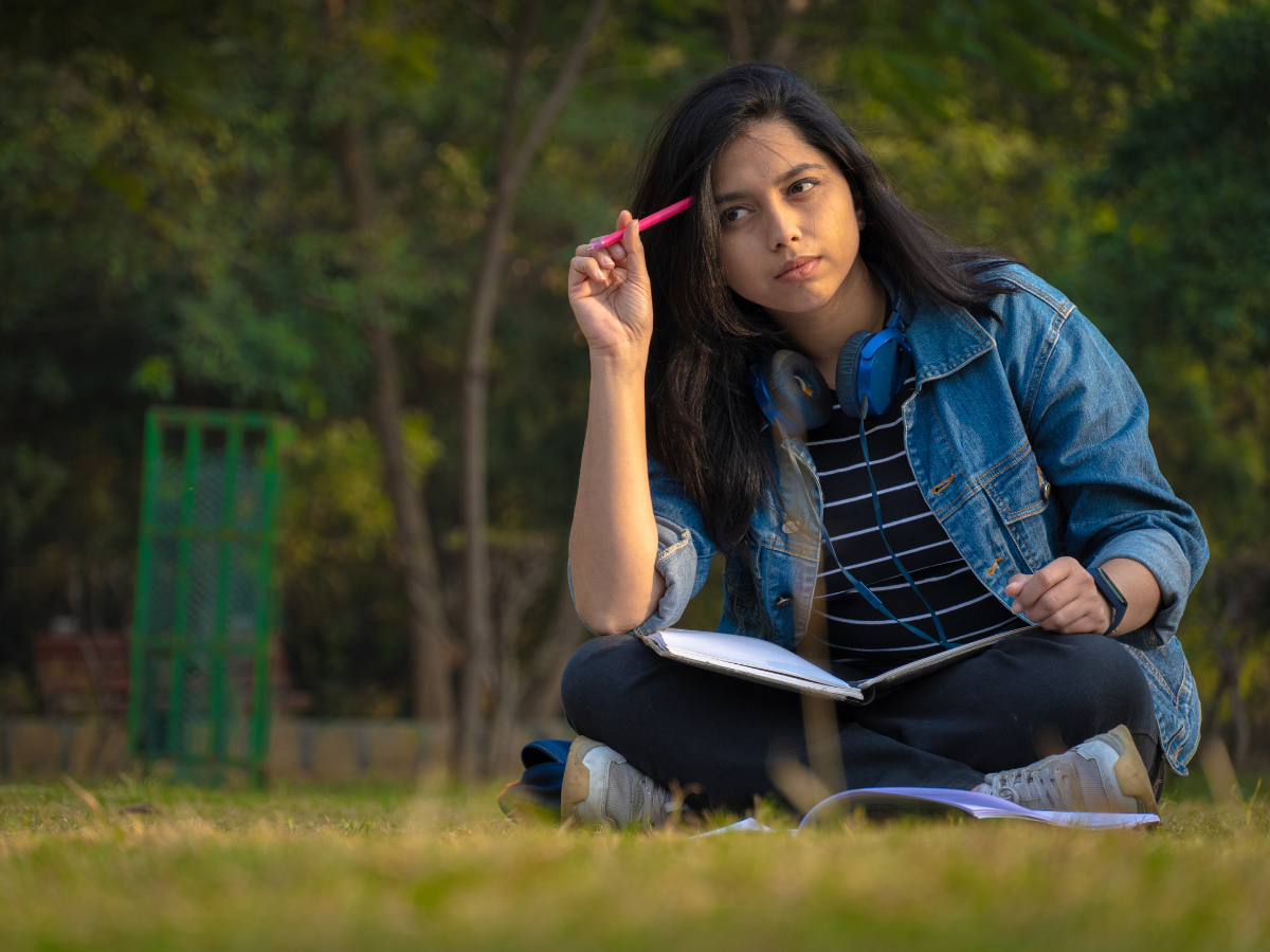 An older student thinking